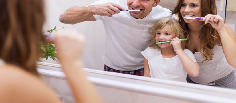 Brushing teeth with child